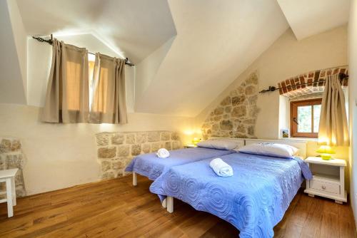 Postel nebo postele na pokoji v ubytování Villa Stone-Exceptional private Estate
