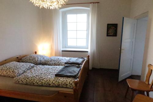 Кровать или кровати в номере Nussbaumhof mit Koppel