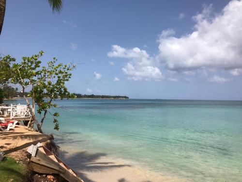 a view of the ocean from the shore of a beach at Casa Barbara in Las Terrenas