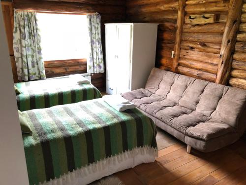Ruang duduk di Laguna Larga Lodge