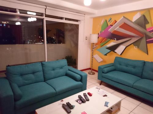 Posezení v ubytování Naths Apartment