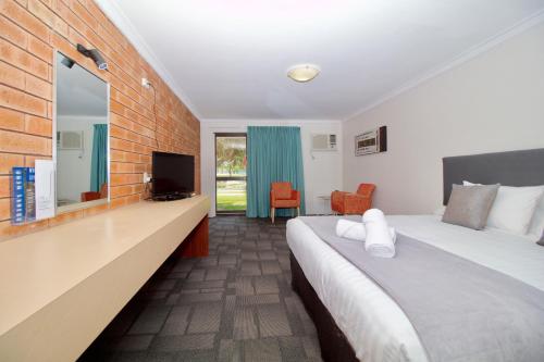 Postel nebo postele na pokoji v ubytování Hotel Clipper