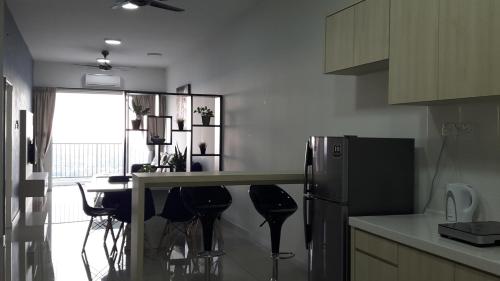 Η κουζίνα ή μικρή κουζίνα στο Taiping Homestay