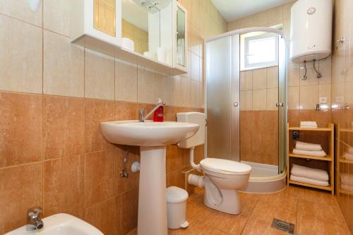 Ένα μπάνιο στο Apartment Oreskovic