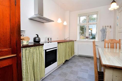 Una cocina o cocineta en Strømpehuset