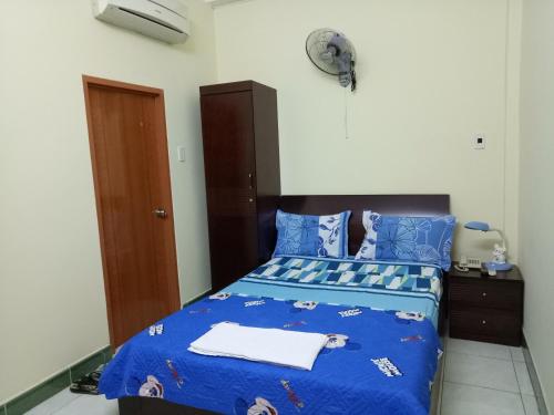 Giường trong phòng chung tại Ngoc Loan Hotel