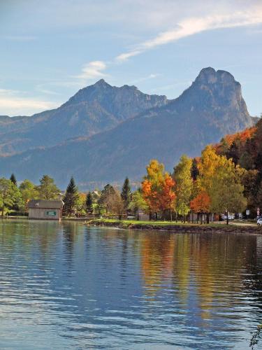 a view of a lake with mountains in the background at Haus Seehof in Sankt Gilgen