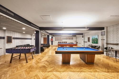 a billiard room with two pool tables in it at Hotel Marina in Vedbæk