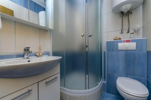 Kúpeľňa v ubytovaní Apartments Bluesun