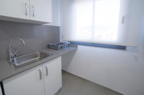 A kitchen or kitchenette at Apartaments Ponent