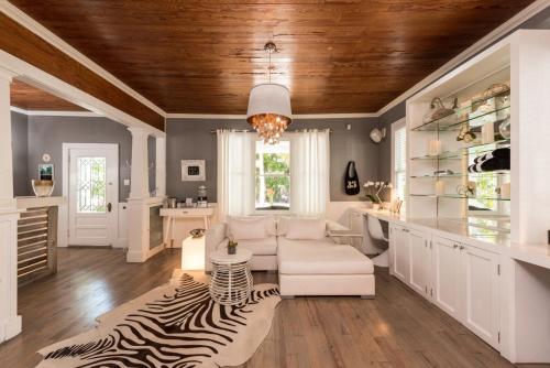 a living room with a zebra rug at Alexander's Guesthouse-Adult Exclusive, LGBTQ Friendly in Key West