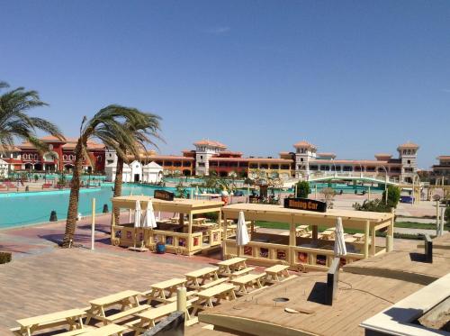 a resort with a swimming pool and a resort at Chalets in Porto Sharm - Families Only AN in Sharm El Sheikh