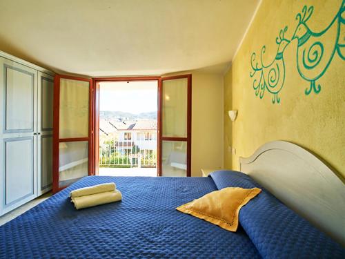 Postel nebo postele na pokoji v ubytování Hotel Jasmine