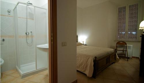 Säng eller sängar i ett rum på Le Stanze Di Nico