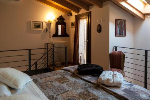 Postel nebo postele na pokoji v ubytování Casa Del Sole