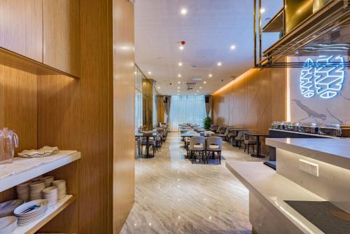 Χώρος καθιστικού στο Guangzhou Mustin Hotel