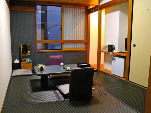 Kuchyň nebo kuchyňský kout v ubytování Satomo Ryokan