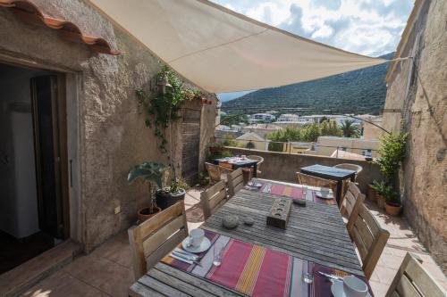 Restaurant ou autre lieu de restauration dans l'établissement U Castellu Guesthouse