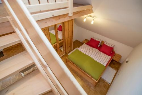an overhead view of a room with two bunk beds at Apartments Rožič Bohinj in Bohinj