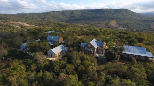 an aerial view of a house on a hill at Ashbourne Hazyview in Hazyview