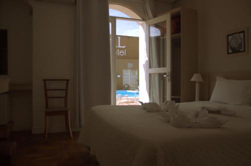 Cama o camas de una habitación en Crigial Hotel