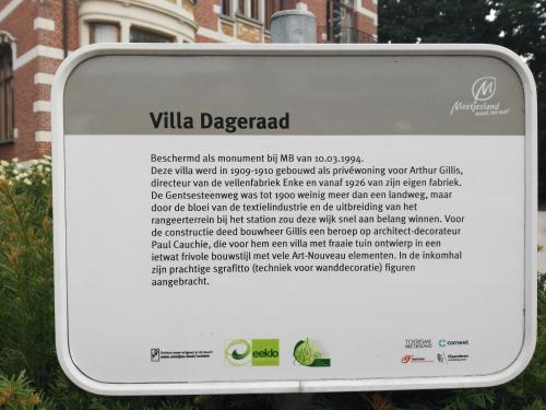 a sign that says ville deprecated in front of a building at Boutique hotel Shamon in Eeklo
