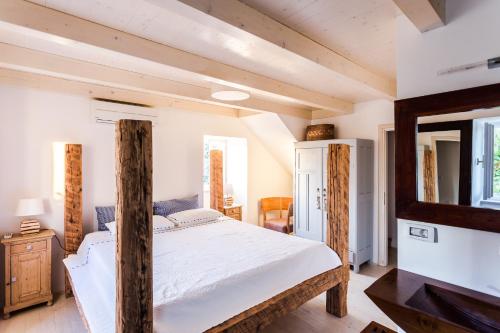 Ένα ή περισσότερα κρεβάτια σε δωμάτιο στο Holiday Home Stancija Srem