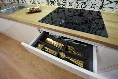 Η κουζίνα ή μικρή κουζίνα στο Tromostovje apartments