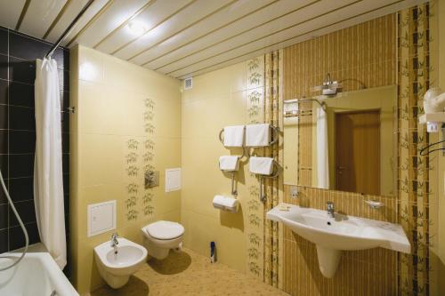 Отель Магнолия tesisinde bir banyo