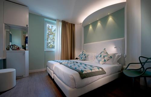 Postel nebo postele na pokoji v ubytování Ark Hotel