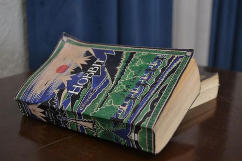 a book sitting on top of a table at Hobbit Boutique Hotel in Bloemfontein