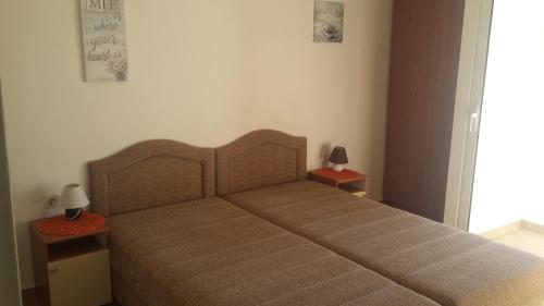 Postel nebo postele na pokoji v ubytování Apartments Teodora Obala