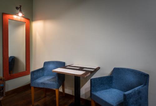 Χώρος καθιστικού στο Treasures Hotel and Suites