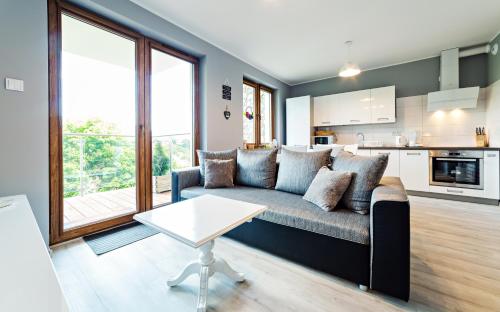 Kuchyň nebo kuchyňský kout v ubytování Ogrodnicza, Sun & Snow