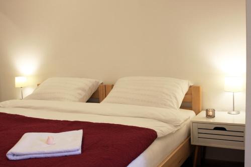 Ένα ή περισσότερα κρεβάτια σε δωμάτιο στο Vila Viktorija