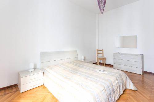 Posteľ alebo postele v izbe v ubytovaní Porta Vittoria Center Apartment