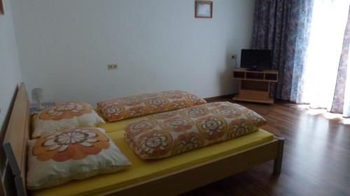 Postel nebo postele na pokoji v ubytování Apartement Hasenauer