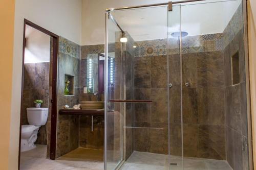 Koupelna v ubytování Hotel Maculís