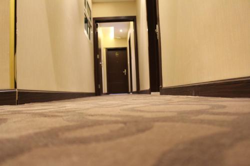 Katil atau katil-katil dalam bilik di Sama Hotel