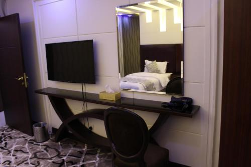 Katil atau katil-katil dalam bilik di Sama Hotel