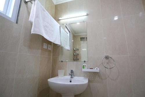 Vonios kambarys apgyvendinimo įstaigoje Diyar Villas Puncak R7-3