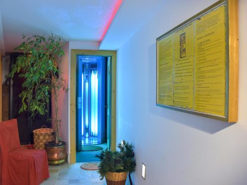 a room with a large menu on the wall at Residence Salvan in Corvara in Badia