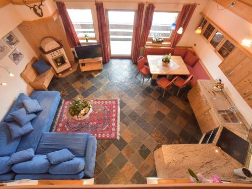 an overhead view of a living room and dining room at Residence Salvan in Corvara in Badia