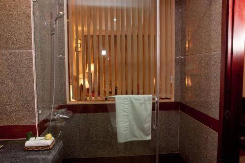 Ванная комната в DLGL - Dung Quat Hotel