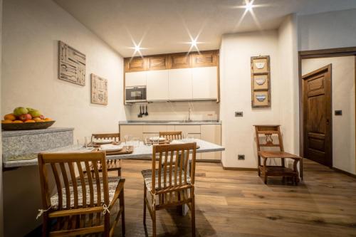 Kuchyň nebo kuchyňský kout v ubytování Maison Aosta