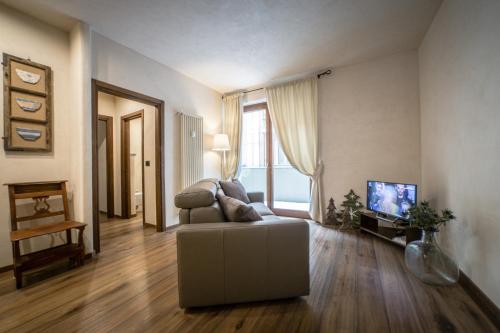 TV a/nebo společenská místnost v ubytování Maison Aosta