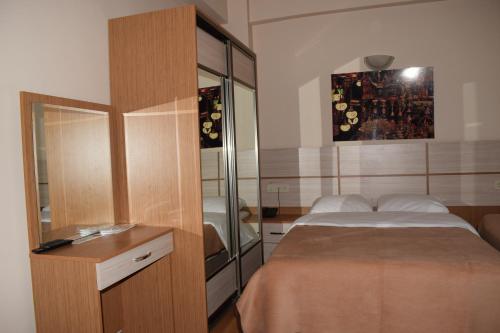 Кровать или кровати в номере Royal Suites Besiktas