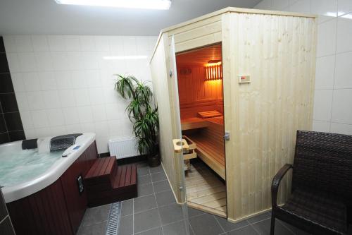 Kúpele alebo wellness v ubytovaní Hotel Maxim Kwidzyn