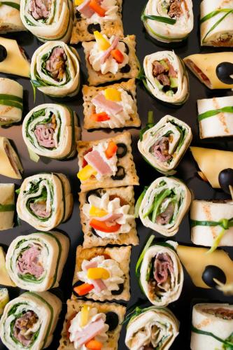 a bunch of sandwiches sitting on a table at Hotel & Restauracja Gniecki in Hrubieszów