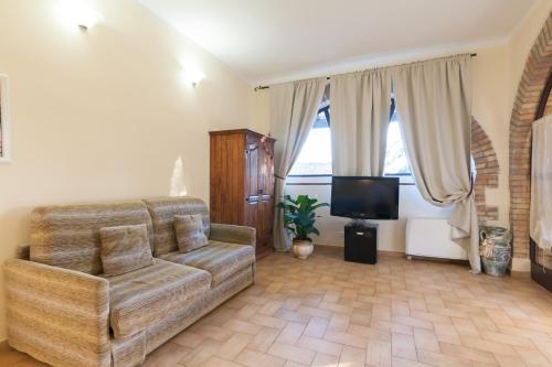 El Molino Agriturismoにあるテレビまたはエンターテインメントセンター